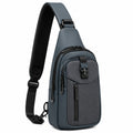 Sac bandoulière 18 x 8 x 31 cm en tissu gris anthracite avec compartiments zippés